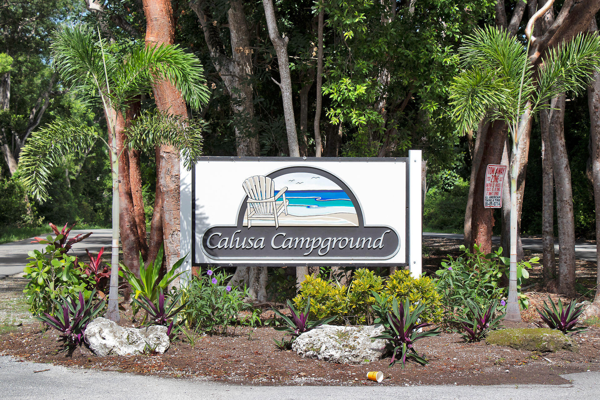 325 Calusa Street, Unit 213 Key Largo, FL 33037 - Photo 9 of 60 a sign on the side of a building