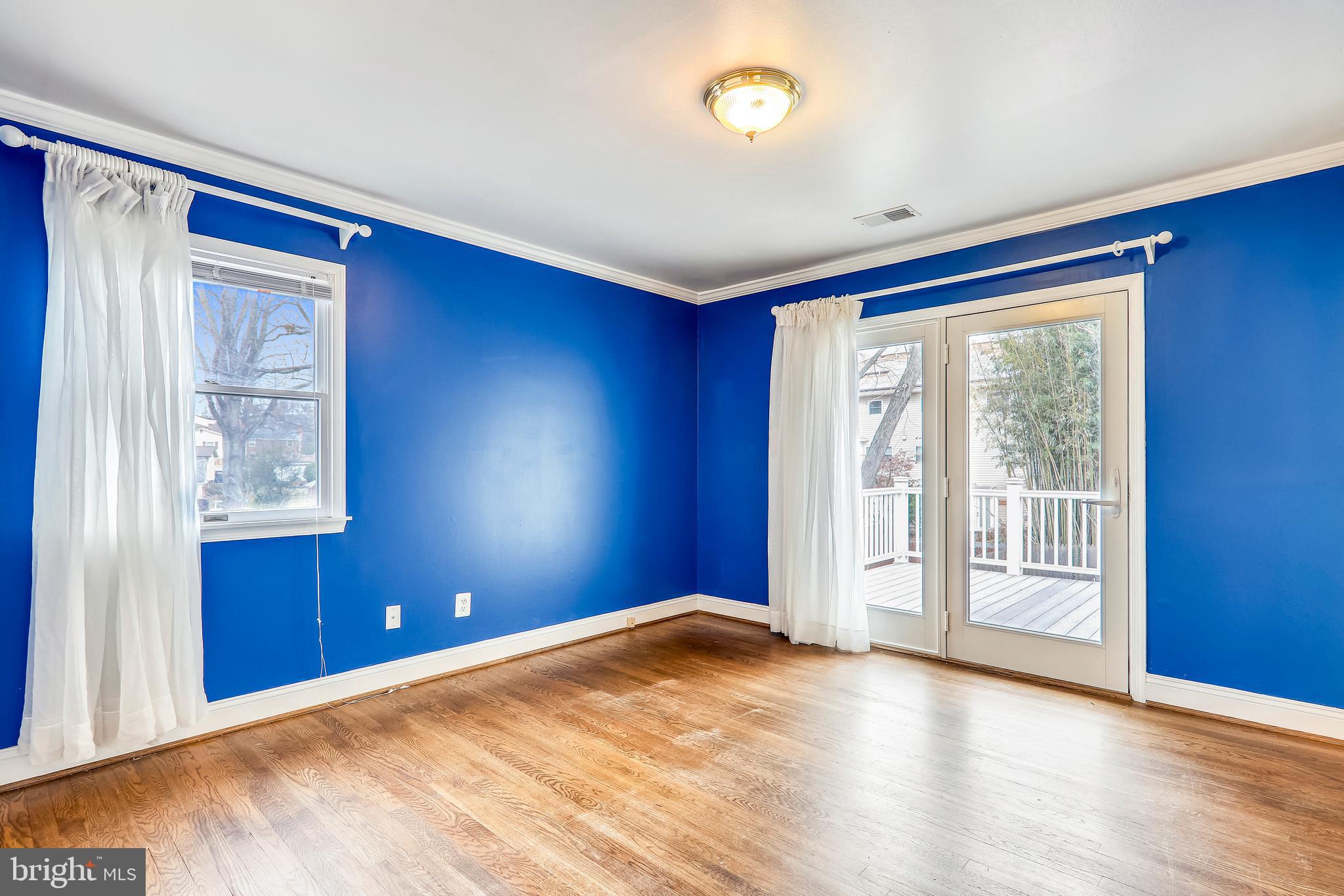 11817 Smoketree Road Potomac, MD 20854 - Photo 29 of 60 Bedroom with access to rear deck