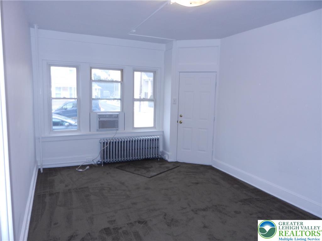 1428 Center Street, Unit 1 Bethlehem, PA 18018 - Photo 3 of 9 an empty room with a window