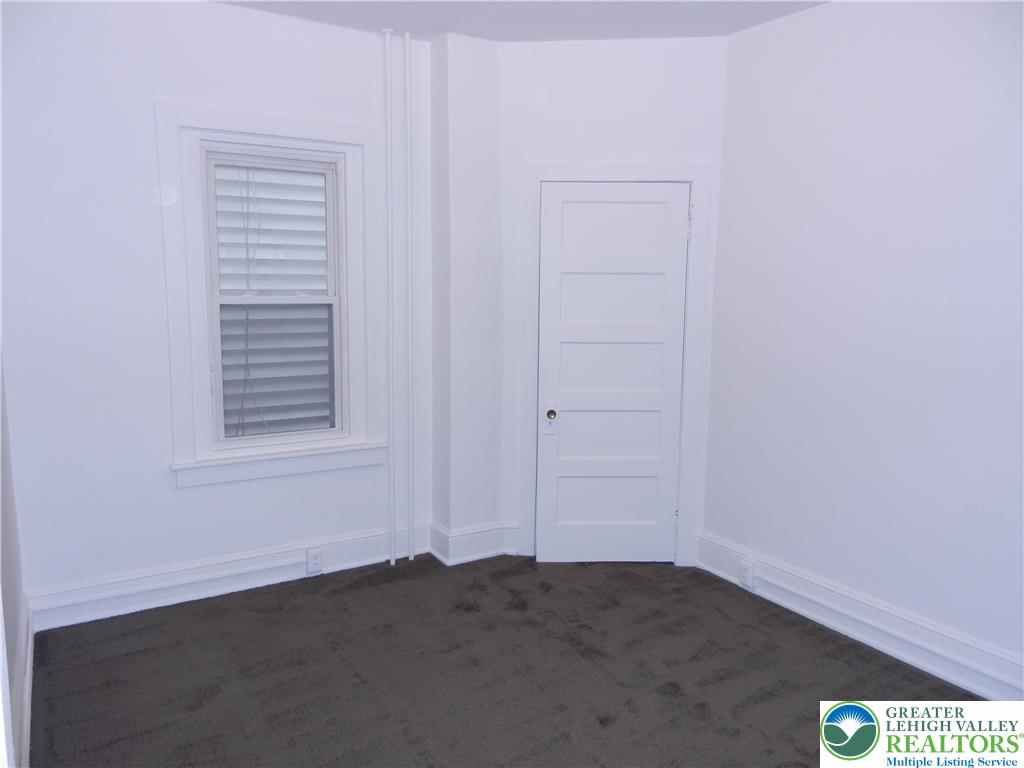 1428 Center Street, Unit 1 Bethlehem, PA 18018 - Photo 9 of 9 an empty room with a window