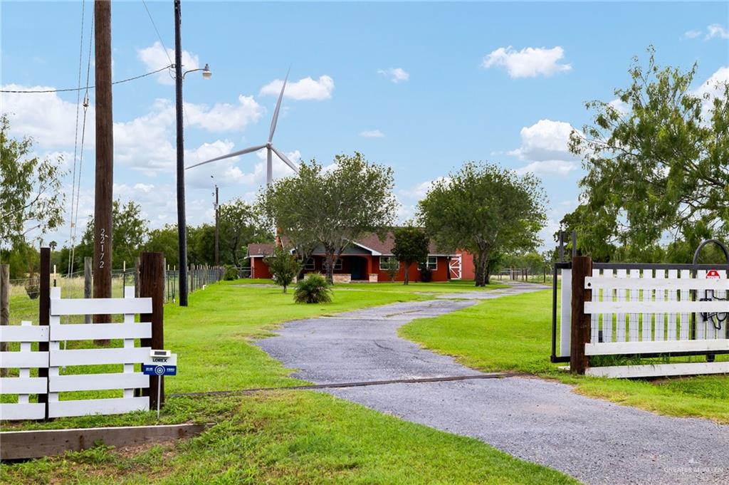 22172 North Olmito Road Rio Hondo, TX 78583 - Photo 3 of 33 a view of a house with a park