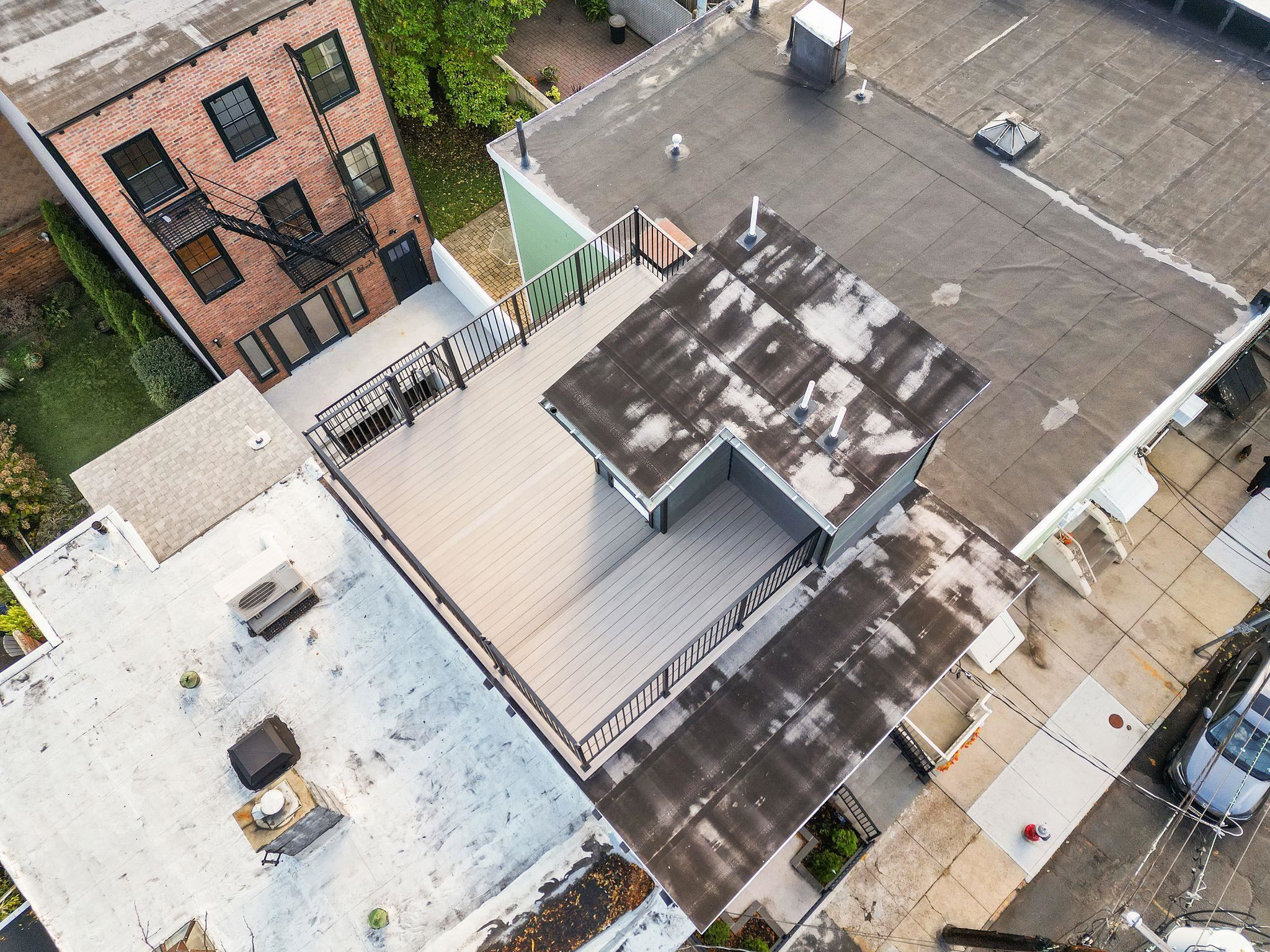 82 Colgate Street, Unit 1 Jersey City, NJ 07302 - Photo 12 of 13 an aerial view of a house with a yard