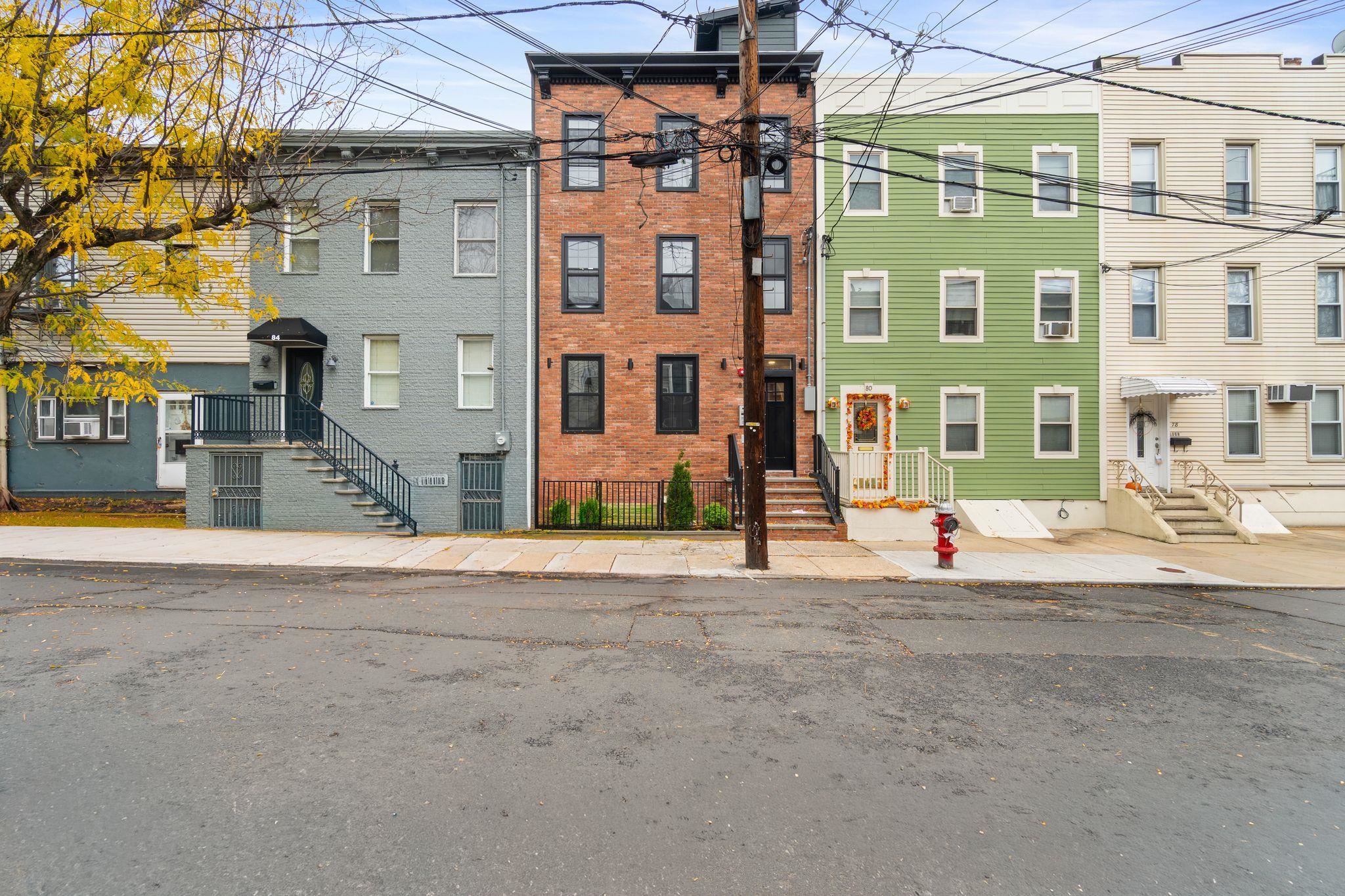 82 Colgate Street, Unit 1 Jersey City, NJ 07302 - Photo 10 of 13 a view of a brick building next to a road