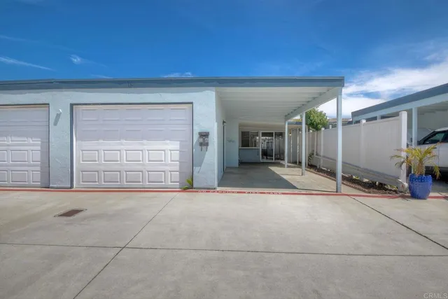 a view of a house with a garden