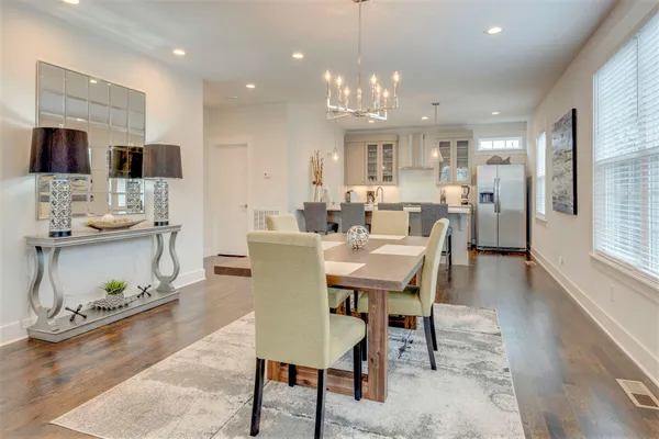 a view of a dining room with furniture