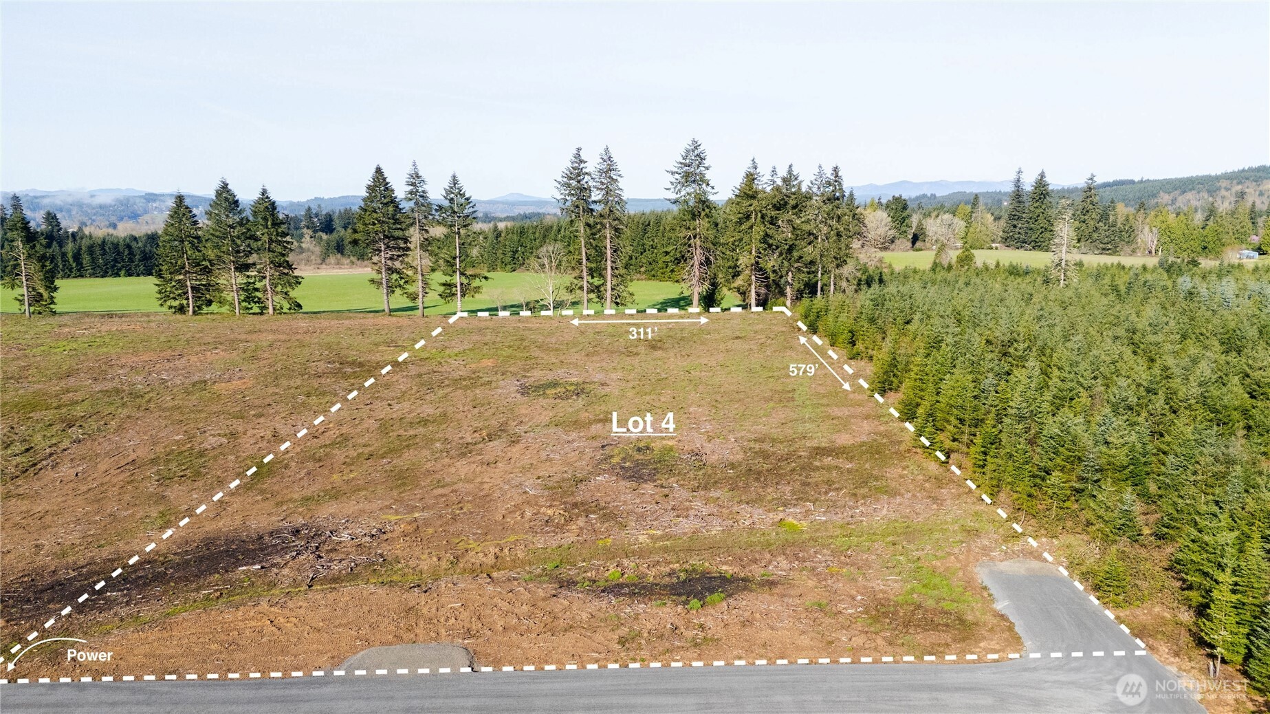 133 Beckett Lane Chehalis, WA 98532 - Photo 2 of 23 a view of a garden with trees