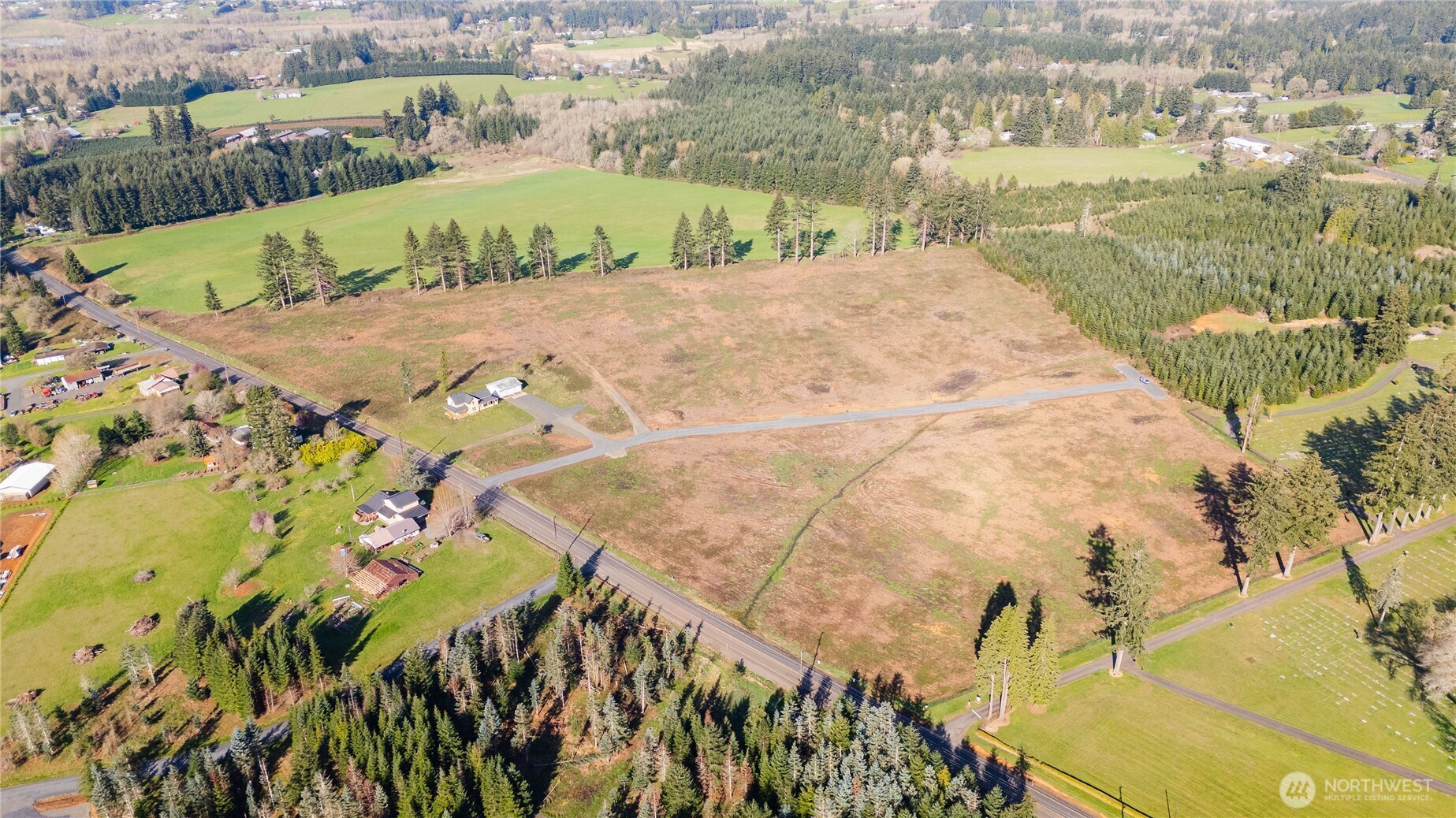 133 Beckett Lane Chehalis, WA 98532 - Photo 21 of 23 a view of a lake with a mountain in the background