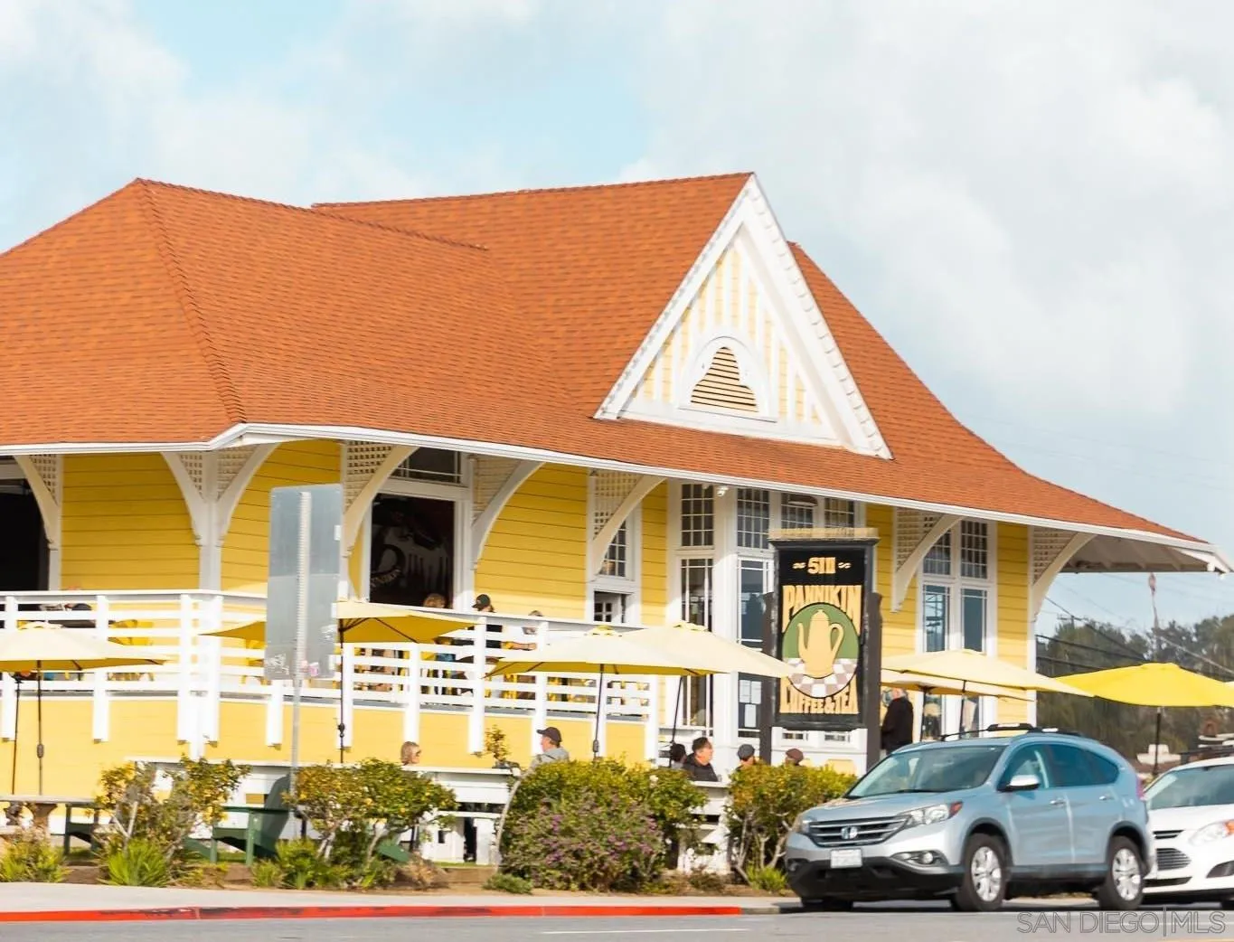 123 Edgeburt Drive Encinitas, CA 92024 - Photo 17 of 22 a front view of a residential apartment building with a yard