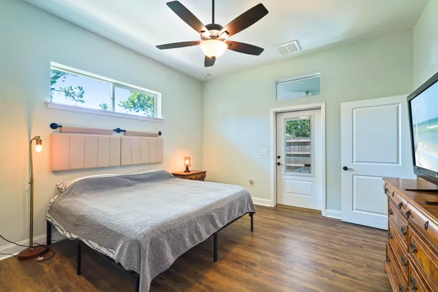 a bathroom with a double vanity sink mirror and shower