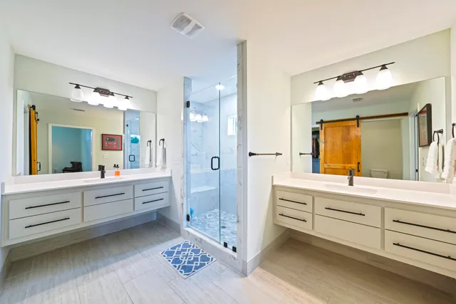 a view of walk in closet with clothes