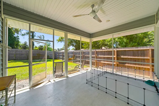 a view of a kitchen with a sink and cabinets