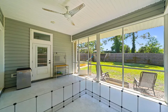 a view of a swimming pool with a yard