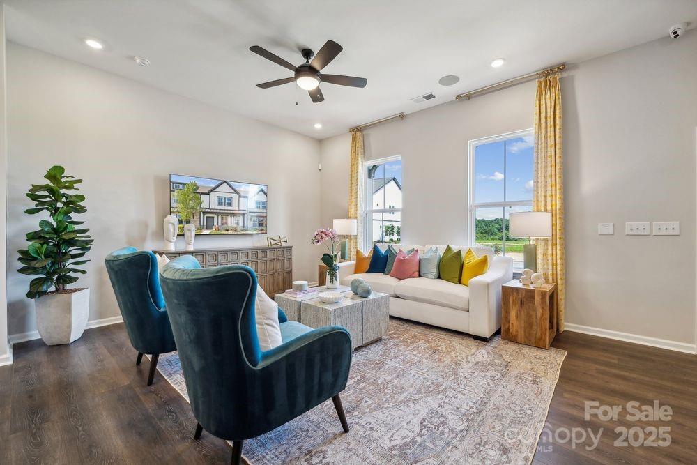 8665 Miles Gap Road Indian Land, SC 29707 - Photo 9 of 31 a living room with furniture and a potted plant