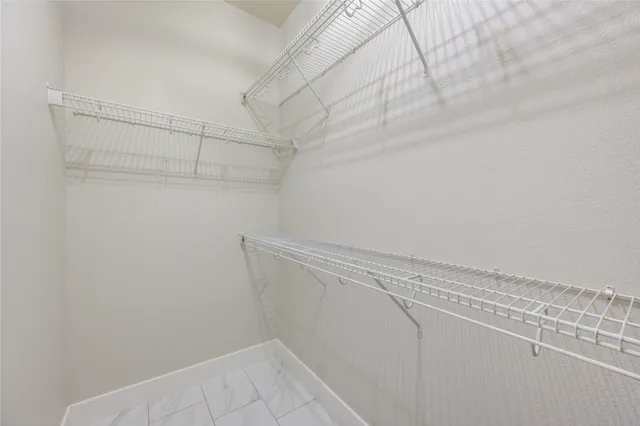 a view of a house with a swimming pool and a porch