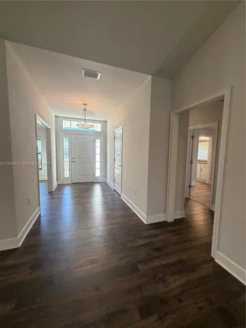 a view of livingroom with wooden floor