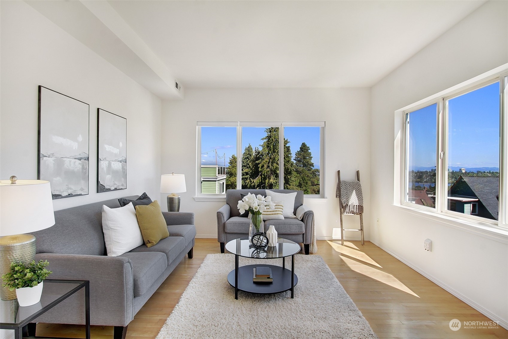 307 North 73rd Street, Unit 5 Seattle, WA 98103 - Photo 12 of 33 a living room with furniture and a large window