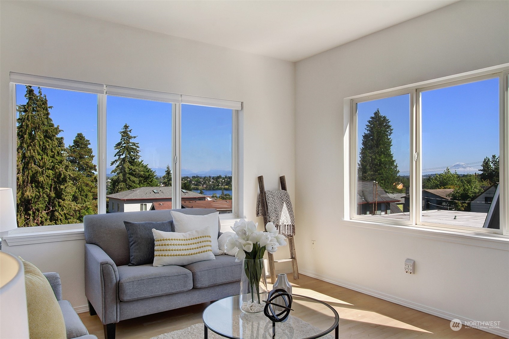 307 North 73rd Street, Unit 5 Seattle, WA 98103 - Photo 13 of 33 a living room with furniture and a large window