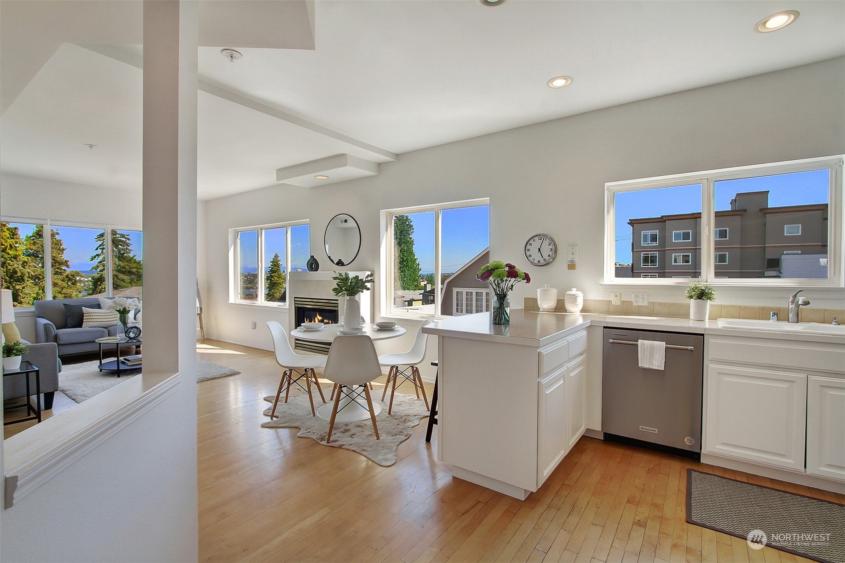 307 North 73rd Street, Unit 5 Seattle, WA 98103 - Photo 19 of 33 a living room with stainless steel appliances furniture and a kitchen view