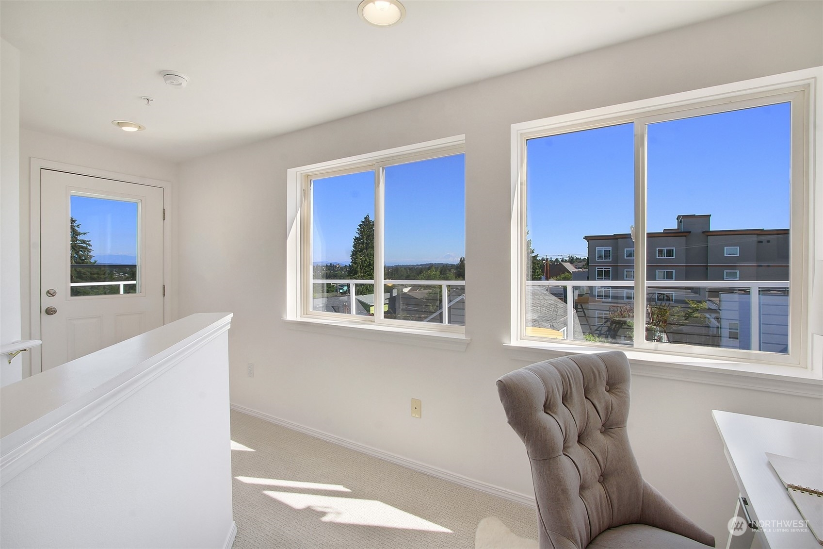 307 North 73rd Street, Unit 5 Seattle, WA 98103 - Photo 22 of 33 a living room with furniture and a window