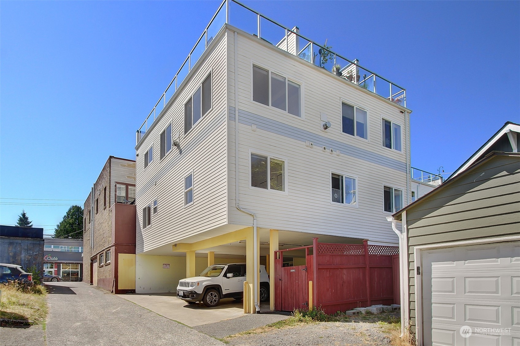 307 North 73rd Street, Unit 5 Seattle, WA 98103 - Photo 29 of 33 a view of a house with a yard