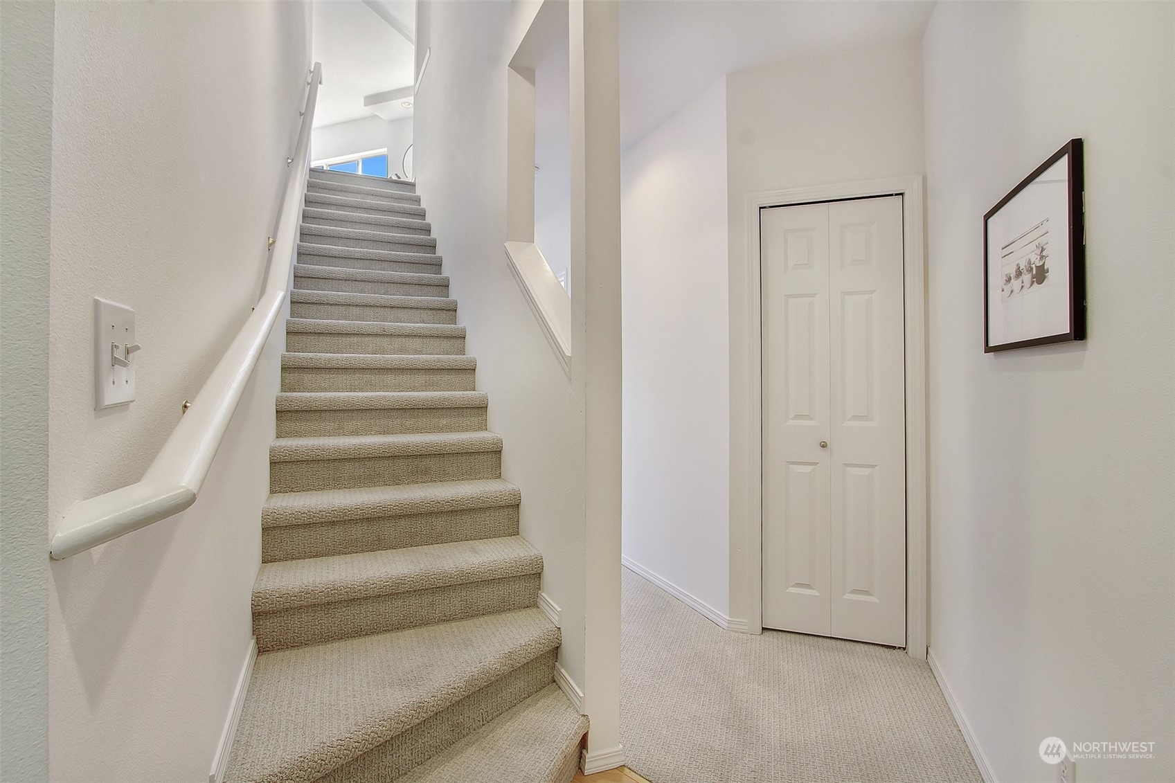 307 North 73rd Street, Unit 5 Seattle, WA 98103 - Photo 4 of 33 a view of an entryway with staircase