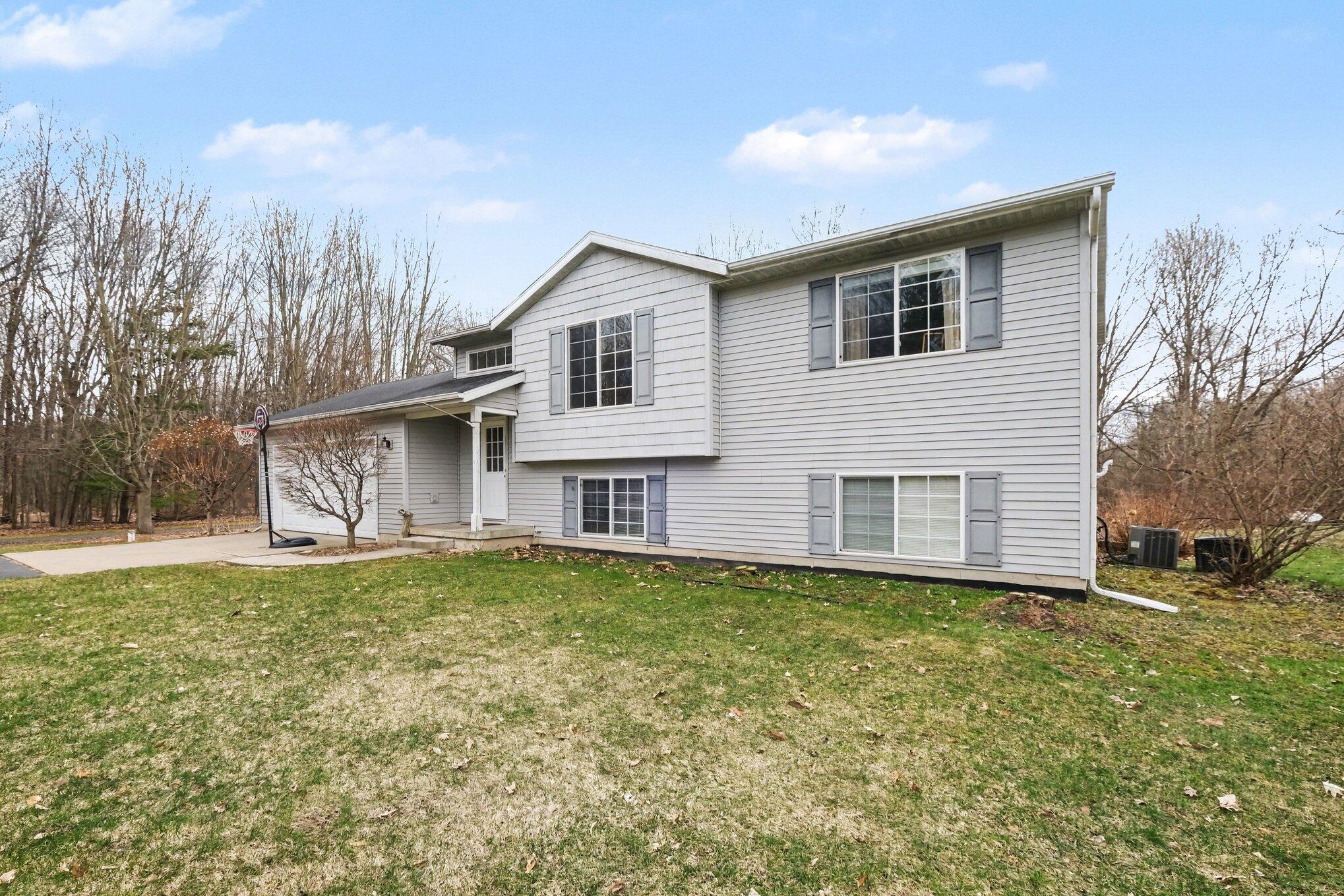 7460 15 Mile Road Northeast Cedar Springs, MI 49319 - Photo 2 of 34 002_file_8442 - Copy