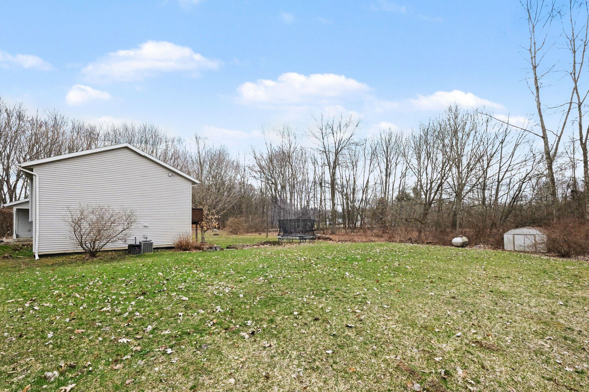 7460 15 Mile Road Northeast Cedar Springs, MI 49319 - Photo 29 of 34 027_file_7046