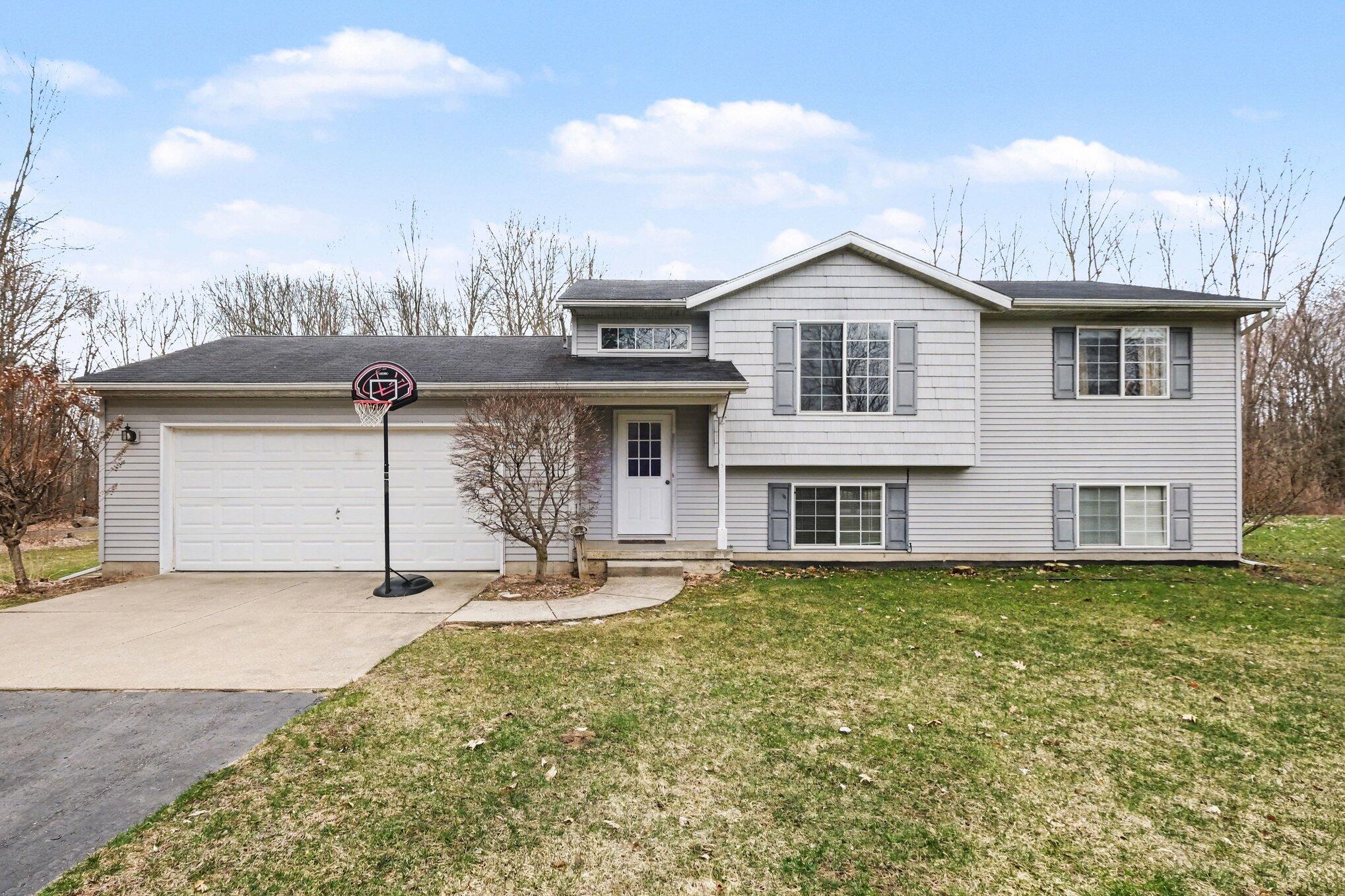 7460 15 Mile Road Northeast Cedar Springs, MI 49319 - Photo 3 of 34 003_file_5455 - Copy