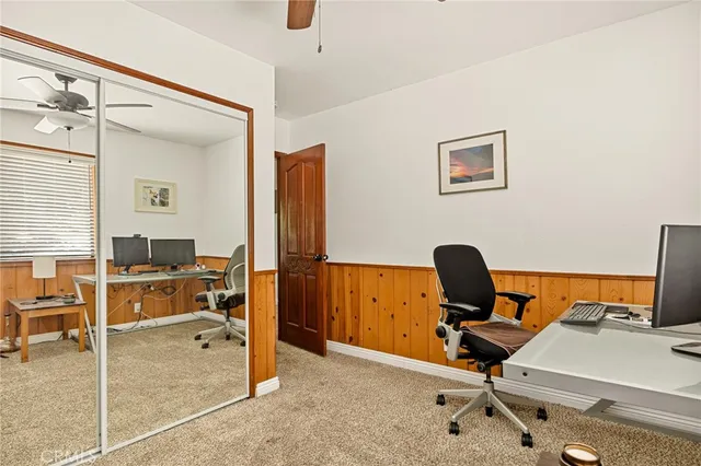 a view of a workspace with furniture