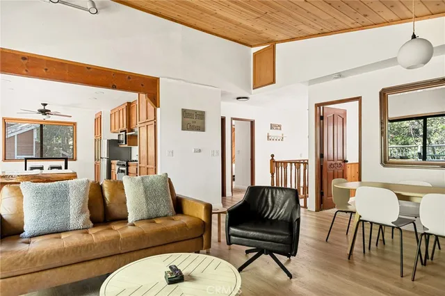 a living room with furniture and a lamp