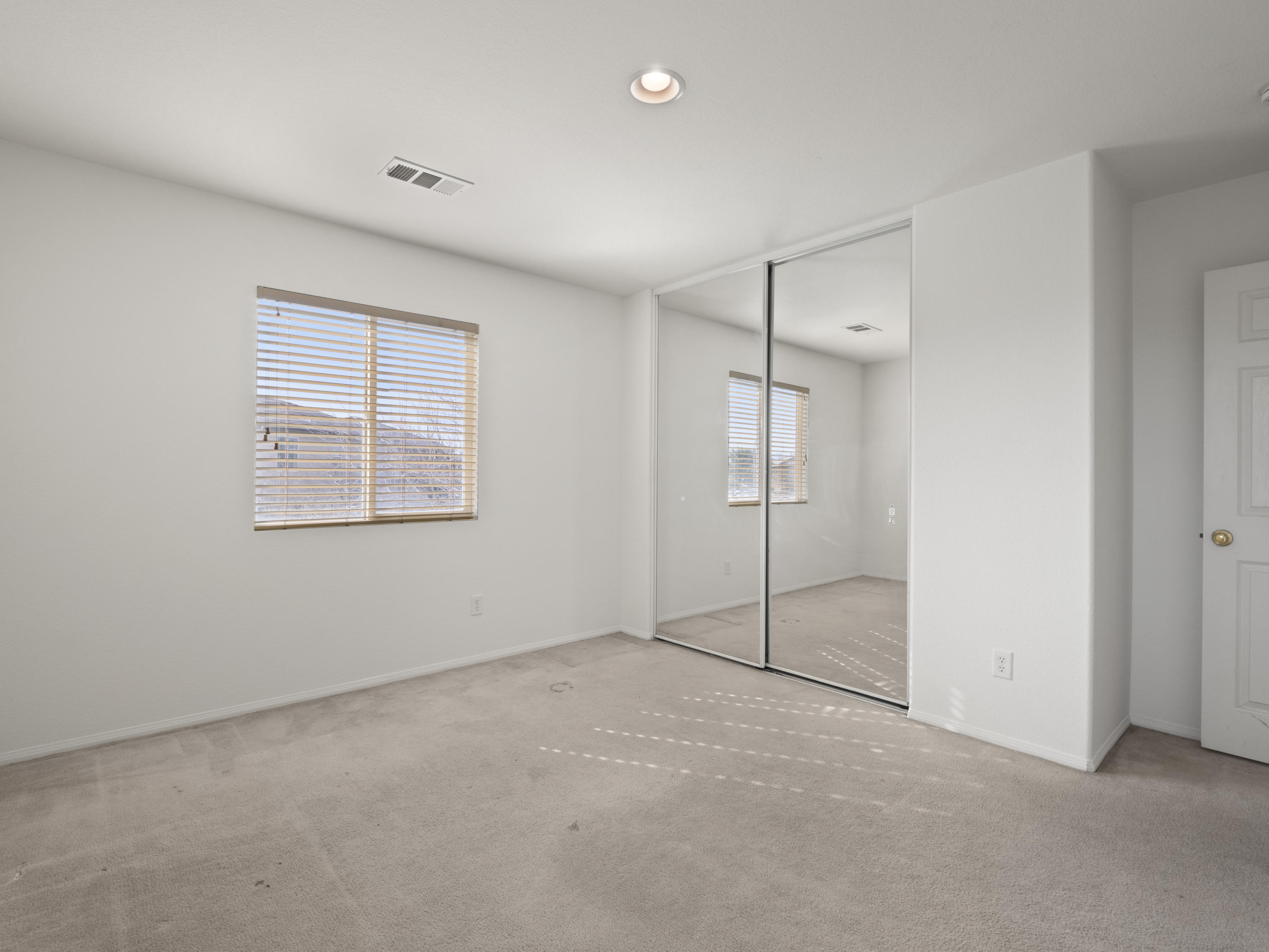 43635 Dana Drive Lancaster, CA 93535 - Photo 14 of 20 an empty room with windows and closet