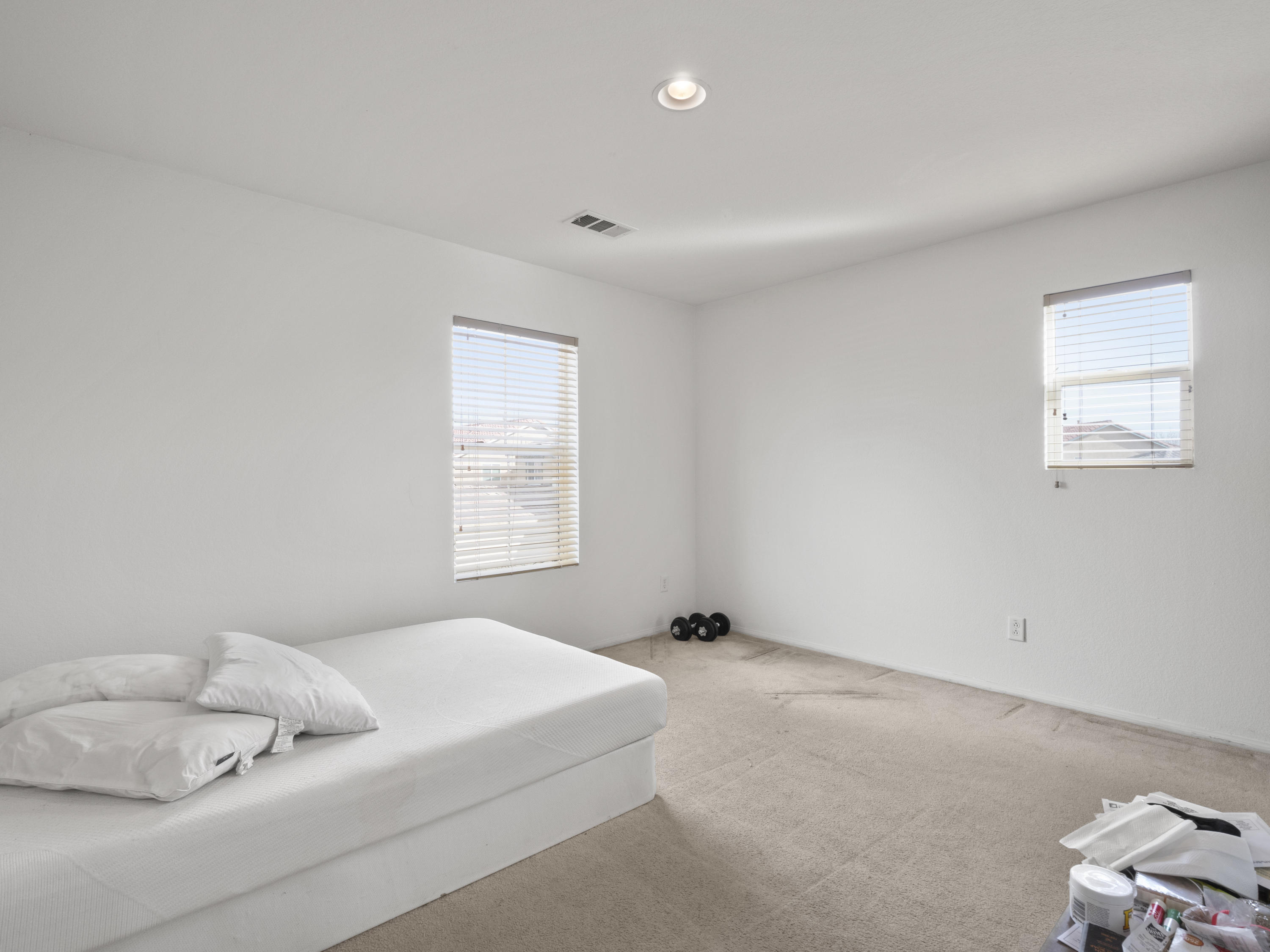 43635 Dana Drive Lancaster, CA 93535 - Photo 16 of 20 a bedroom with a bed and a window