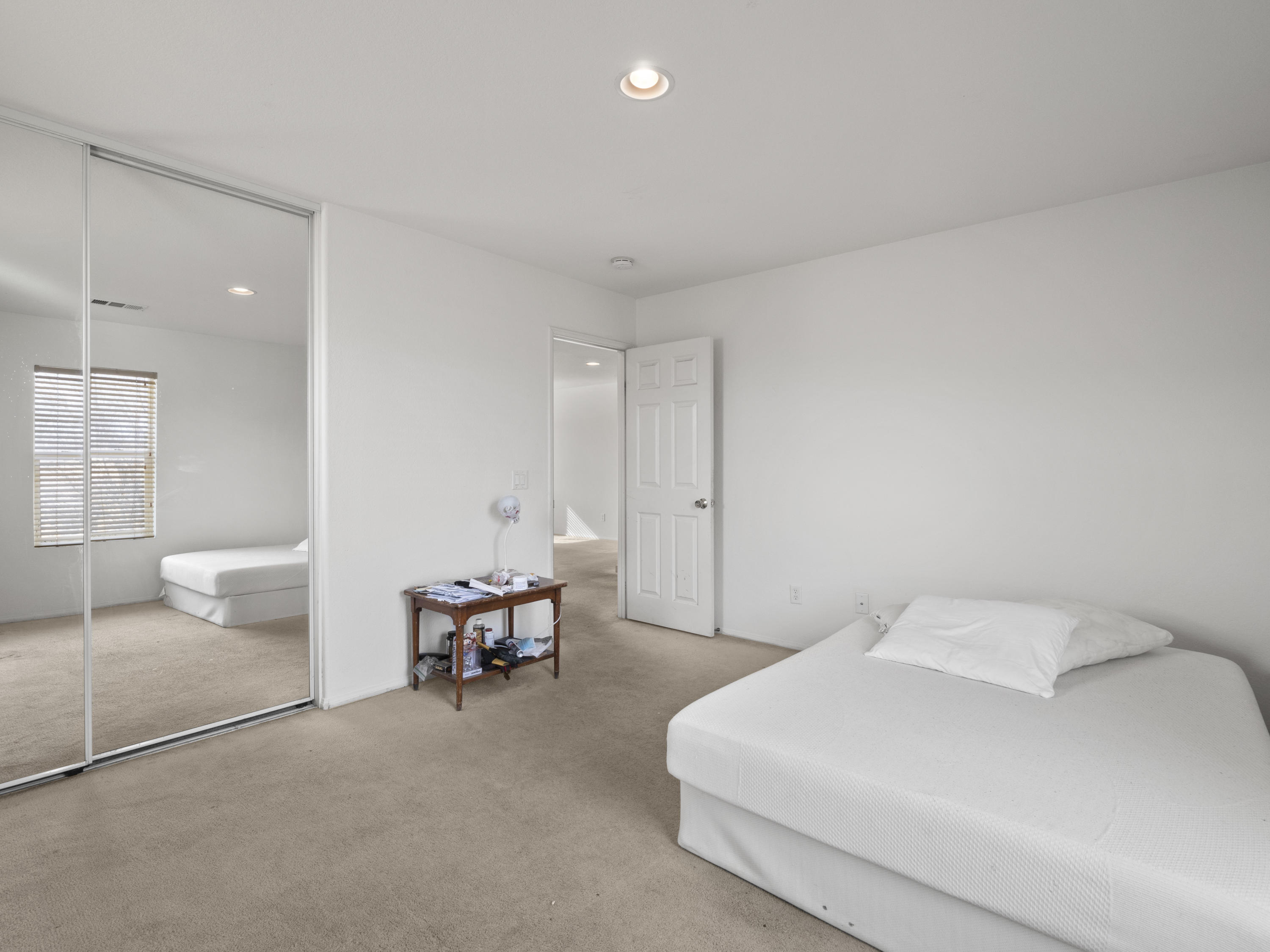 43635 Dana Drive Lancaster, CA 93535 - Photo 17 of 20 a spacious bedroom with a bed and window