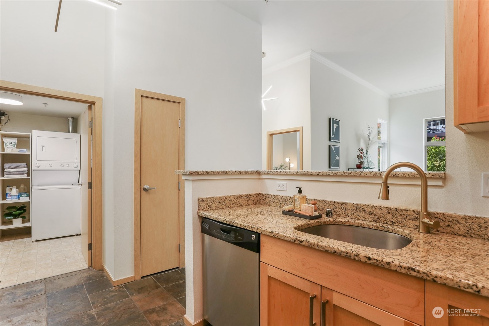 3333 Wallingford Avenue North, Unit 101 Seattle, WA 98103 - Photo 11 of 26 a bathroom with double sink and a mirror
