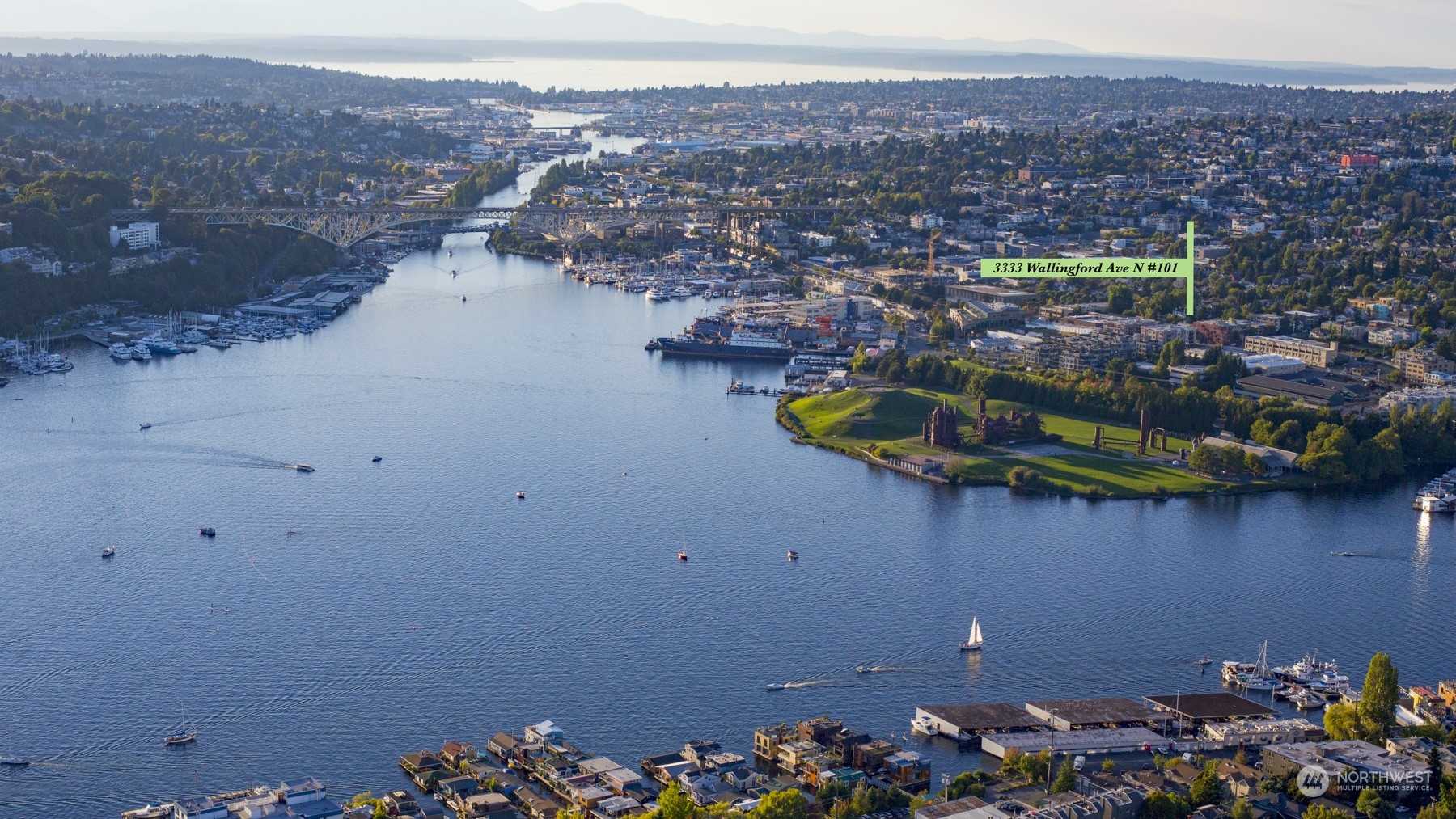 3333 Wallingford Avenue North, Unit 101 Seattle, WA 98103 - Photo 26 of 26 an aerial view of a house with a lake view
