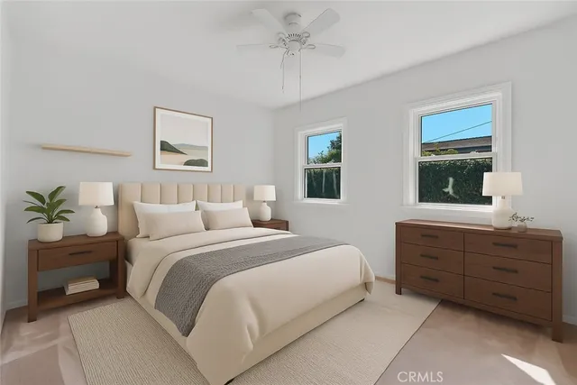 a bathroom with a sink toilet vanity and shower