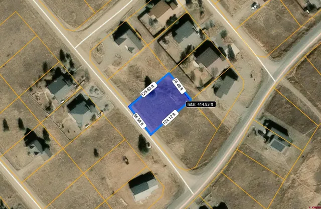 an aerial view of a house with a fireplace