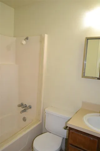a bathroom with a sink and a toilet