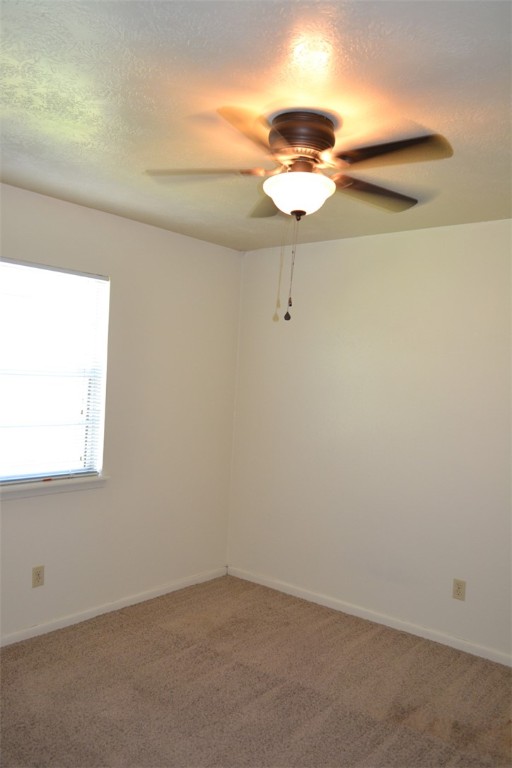 1116 Dexter Drive South College Station, TX 77840 - Photo 7 of 11 an empty room with a window
