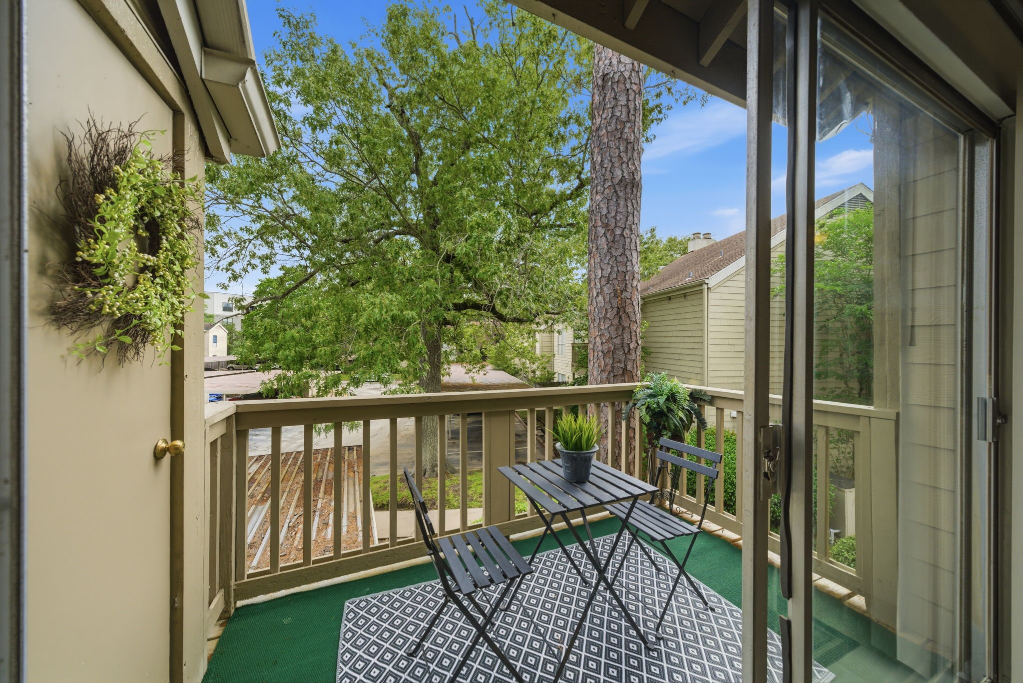 2100 Tanglewilde Street, Unit 750 Houston, TX 77063 - Photo 16 of 23 Nice private patio with nice view of the wooded community.