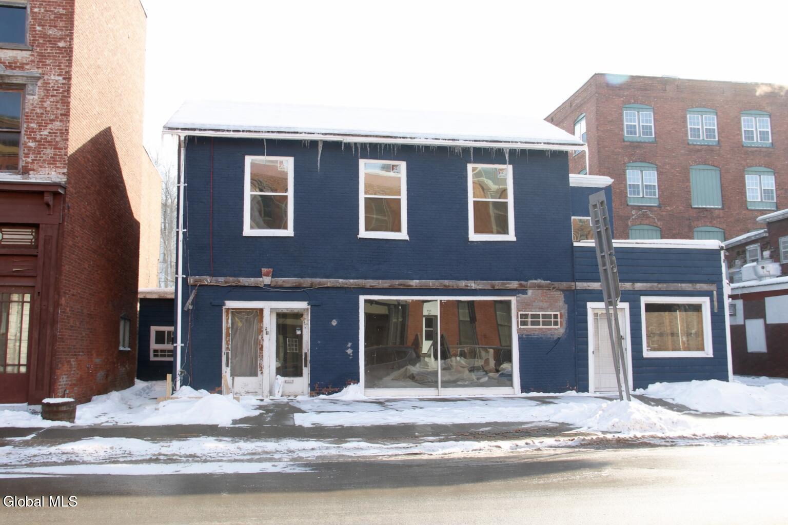 Snowy street renovation scene
