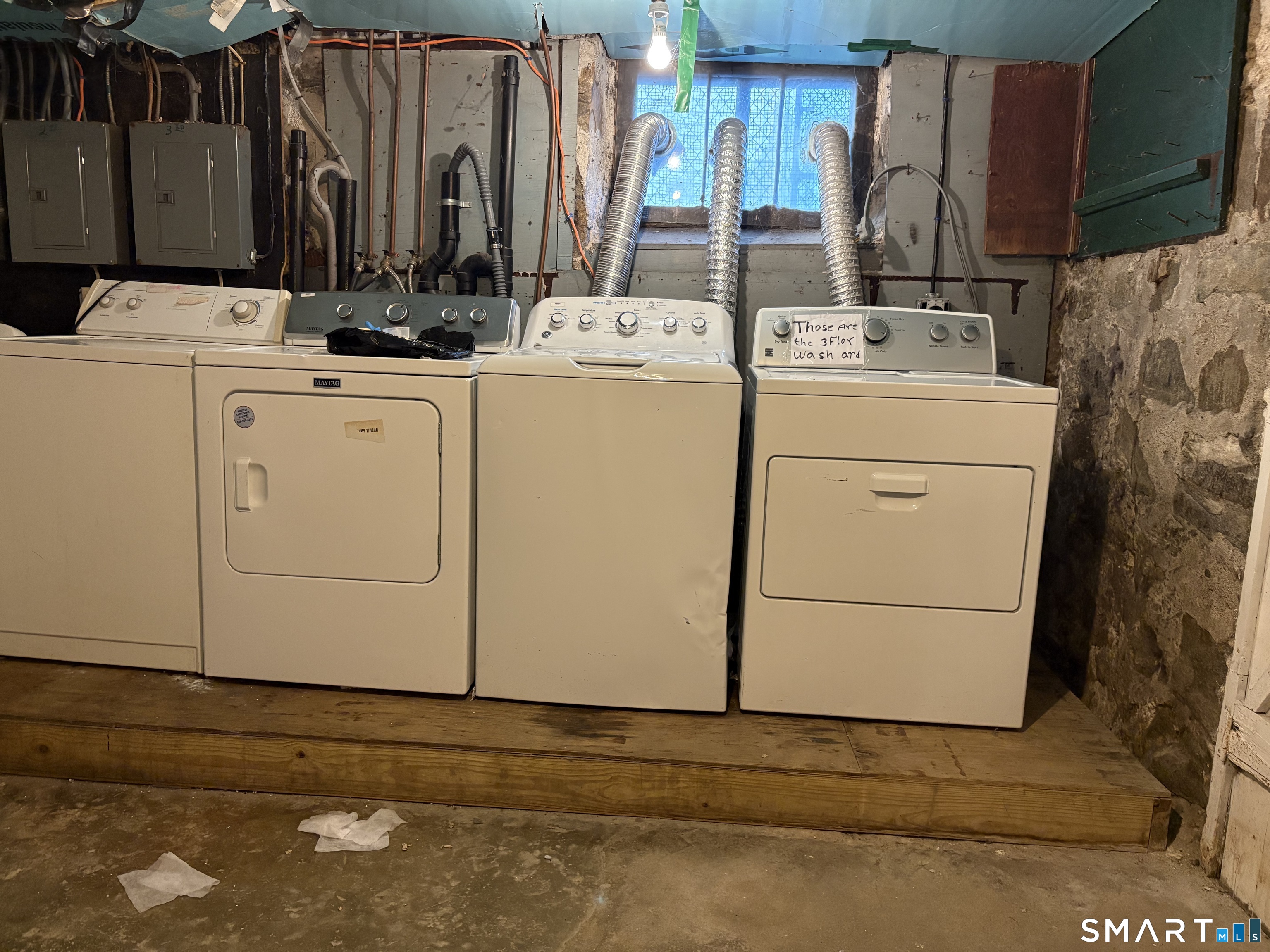 164 French Street, Unit 3 Bridgeport, CT 06606 - Photo 13 of 13 a utility room with dryer and washer