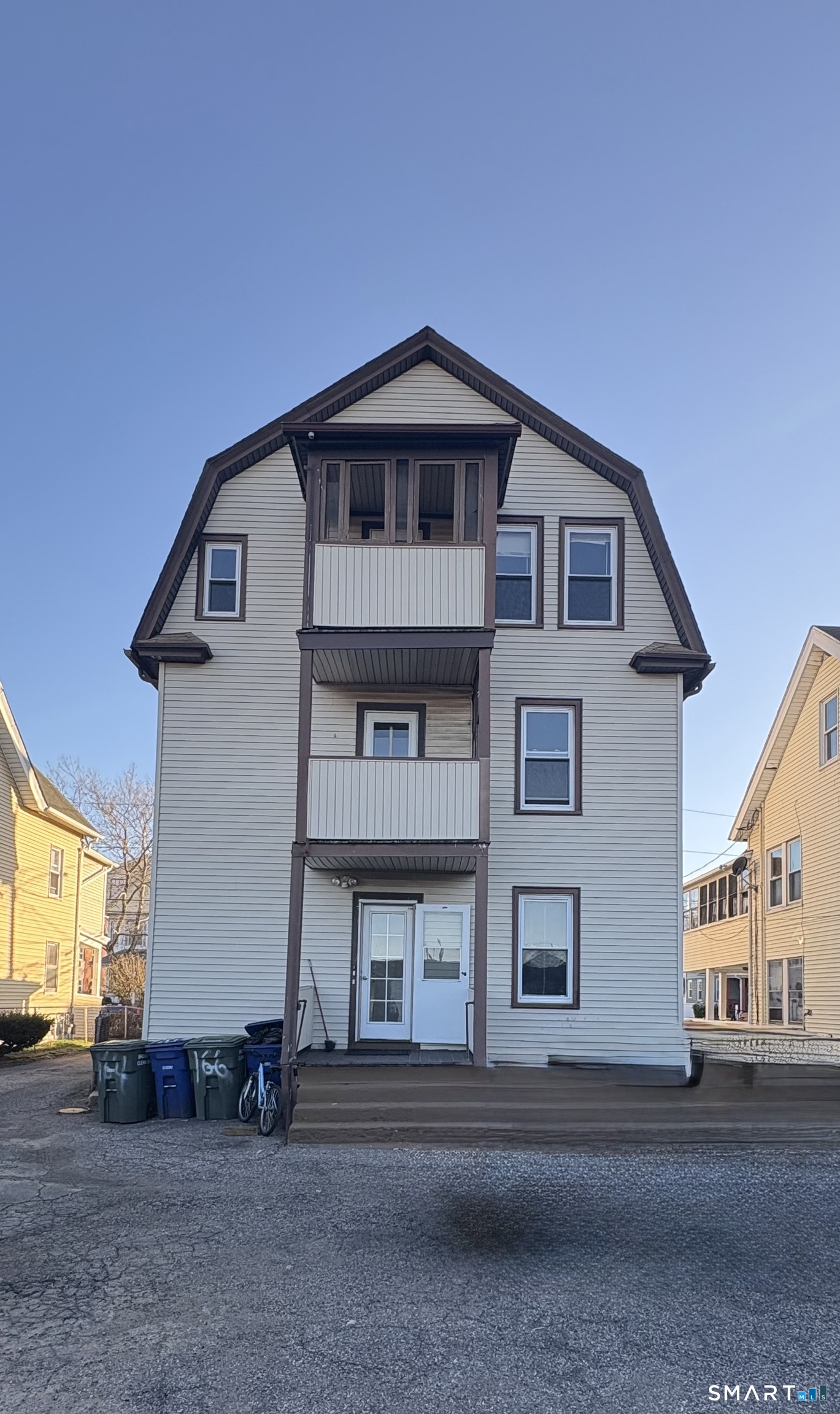 164 French Street, Unit 3 Bridgeport, CT 06606 - Photo 2 of 13 a front view of a house with a yard