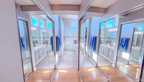 a view of entryway and hall with dining room