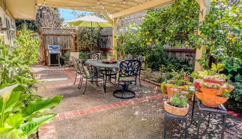 a view of outdoor dining space with a patio