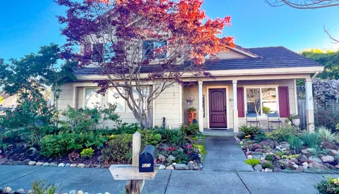 front view of a house with a small yard