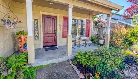 a front view of a house with a porch