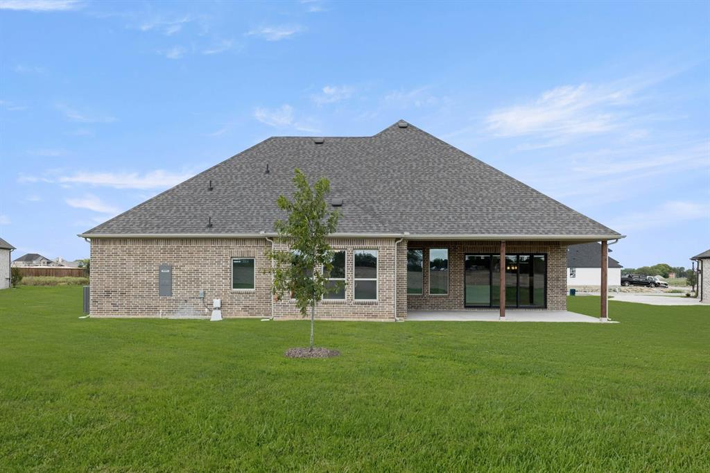 132 Evanston Court Rhome, TX 76078 - Photo 39 of 40 132 Evanston-Back-2