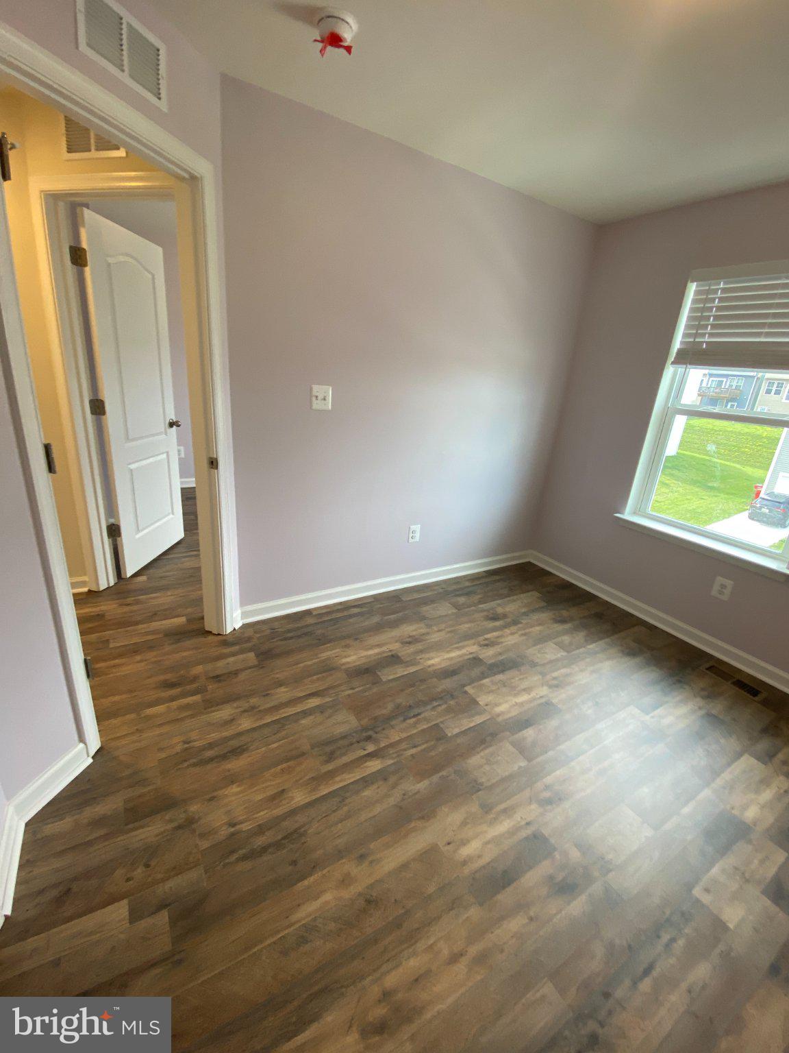 128 Tuxford Road Falling Waters, WV 25419 - Photo 21 of 27 Bright, inviting room with natural light.