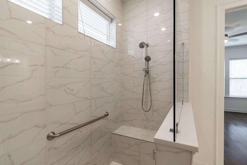 6954 Scenic Overlook Trace Flowery Branch, GA 30542 - Photo 30 of 55 a bathroom with a shower